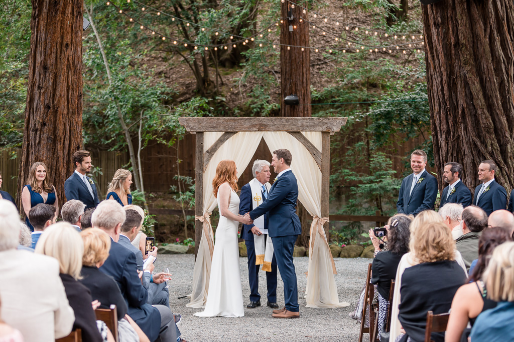 Wedding ceremony in the Main Redwood Grove at Deer Park Villa
